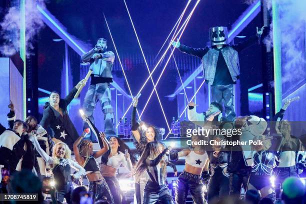 Manuel Turizo and Marshmello perform onstage at the Billboard Latin Music Awards 2023 held at Watsco Center on October 5, 2023 in Coral Gables,...