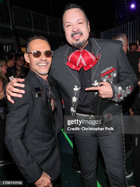 Marc Anthony and Pepe Aguilar at the Billboard Latin Music Awards 2023 held at Watsco Center on October 5, 2023 in Coral Gables, Florida.