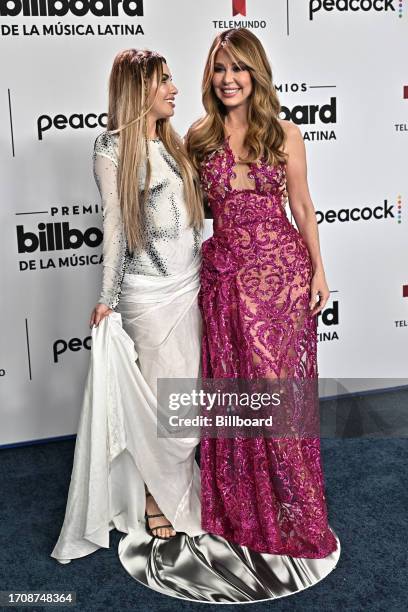 Guest and Myrka Dellanos at the Billboard Latin Music Awards 2023 held at Watsco Center on October 5, 2023 in Coral Gables, Florida.