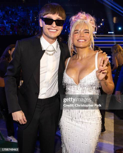 Peso Pluma and Karol G at the Billboard Latin Music Awards 2023 held at Watsco Center on October 5, 2023 in Coral Gables, Florida.