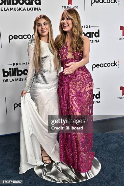 Guest and Myrka Dellanos at the Billboard Latin Music Awards 2023 held at Watsco Center on October 5, 2023 in Coral Gables, Florida.