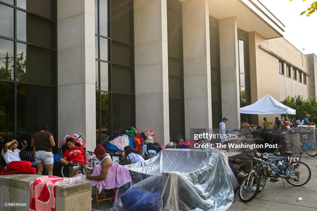 Migrants Are Seen At The Chicago Police Department's 15th District In Chicago