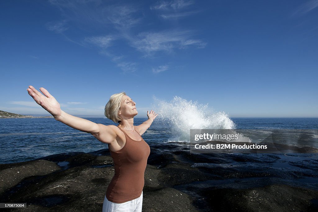 Woman exercising on beach