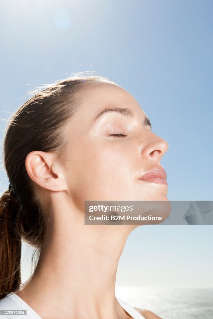Portrait of young woman meditating