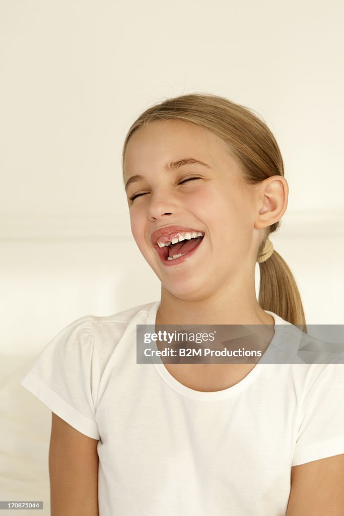 Portrait of girl laughing