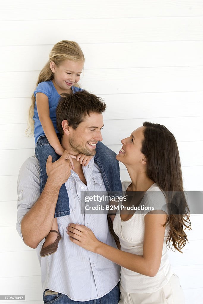 Happy family with daughter, portrait