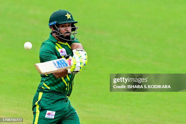 Pakistan's Aamer Jamal plays a shot during the 2022 Asian Games men's second semi-final cricket match between Pakistan and Afghanistan in Hangzhou in...