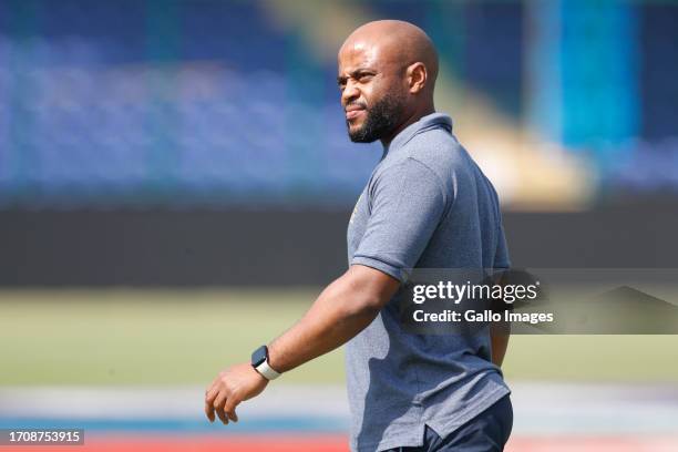 South Africa's captain Temba Bavuma arrives for a news conference prior to the South Africa men's national cricket team nets session at Arun Jaitley...