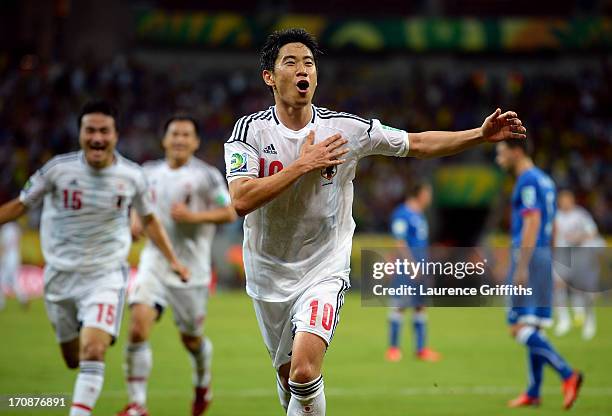 Shinji Kagawa of Japan celebrates scoring his team's second goal during the FIFA Confederations Cup Brazil 2013 Group A match between Italy and Japan...