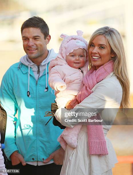 Television presenter Brodie Harper and her husband Heath Meldrum play with their daughter Jessica before the Shane Crawford Charity Bike Ride at...