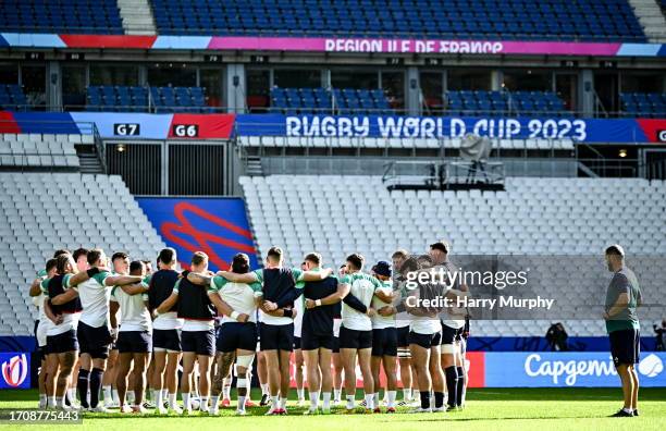 Paris , France - 6 October 2023; Head coach Andy Farrell watches his players huddle during an Ireland rugby captain's run at the Stade de France in...