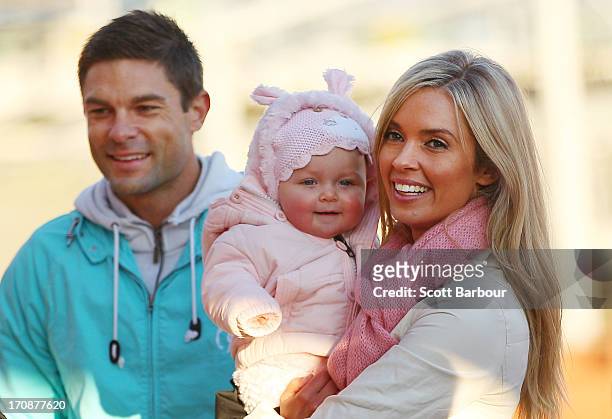 Television presenter Brodie Harper and her husband Heath Meldrum play with their daughter Jessica before the Shane Crawford Charity Bike Ride at...