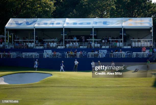 Wei-Ling Hsu of Taiwan, Polly Mack of Germany and Annie Park of the United States on the 18th green during the first round of the Walmart NW Arkansas...