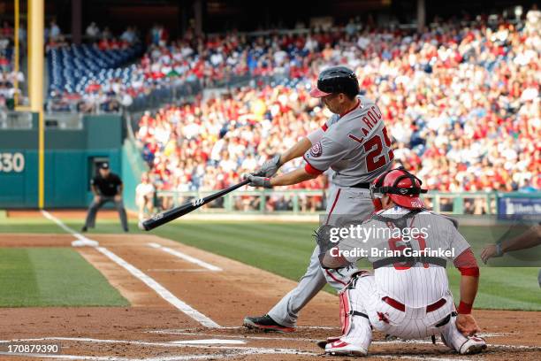 Adam LaRoche of the Washington Nationals gets a base hit in the second inning of the game against the Philadelphia Phillies at Citizens Bank Park on...