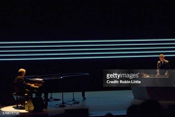 Ryuichi Sakamoto and Alva Noto perform on stage at the Royal Festival Hall on June 19, 2013 in London, England.