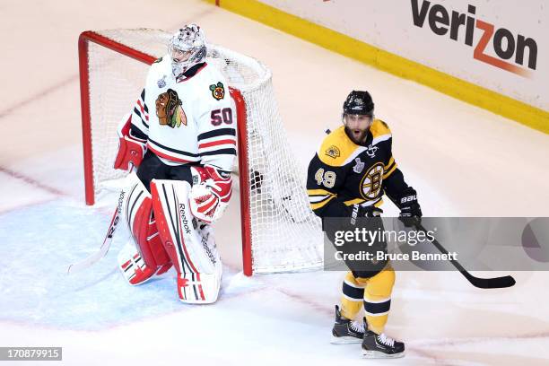 Rich Peverley of the Boston Bruins celebrates after scoring a goal in the first period against Corey Crawford of the Chicago Blackhawks in Game Four...