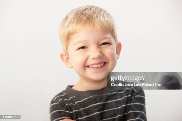 caucasian boy smiling - fair haired boy stock pictures, royalty-free photos & images