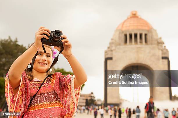 mixed race girl taking pictures on city street, mexico city, federal district, mexico - mexico city tourist stock pictures, royalty-free photos & images