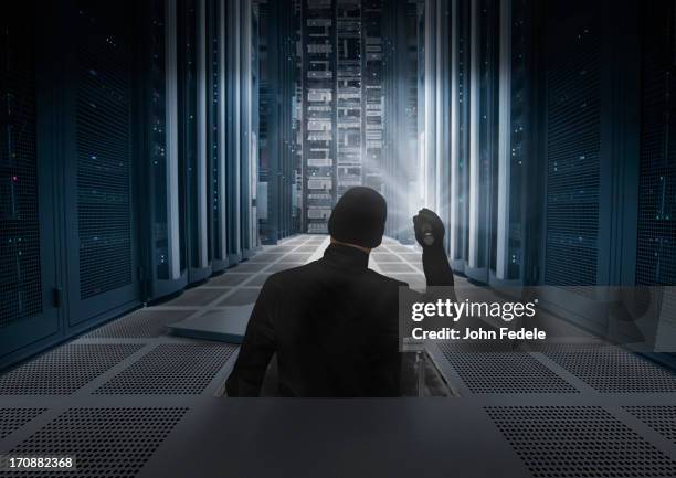 caucasian man shining light in air vent - entering data stock pictures, royalty-free photos & images