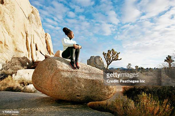 black runner in desert landscape, joshua tree national park, california, united states - joshua tree stock pictures, royalty-free photos & images