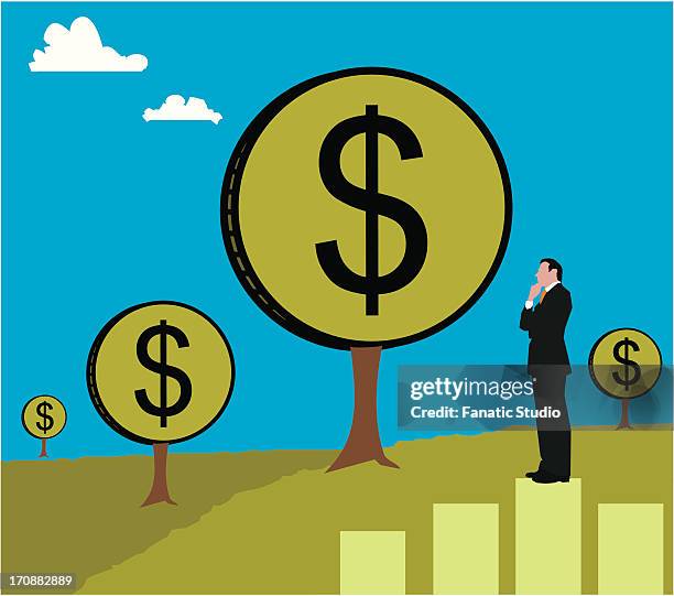 businessman standing on a bar graph looking at a money tree - geld wächst nicht auf bäumen stock-grafiken, -clipart, -cartoons und -symbole