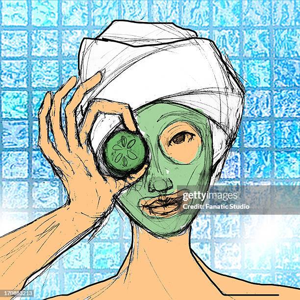 close-up of a woman with facial mask on her face - gurkenmaske stock-grafiken, -clipart, -cartoons und -symbole