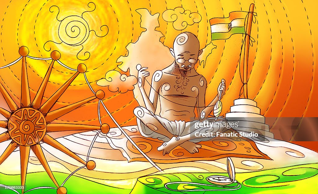 Mahatma Gandhi spinning thread on spinning wheel