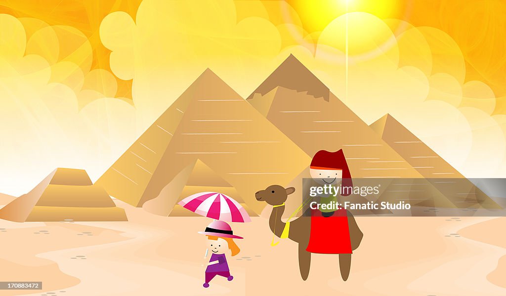 Tourist near pyramids with a guide, Giza Pyramids, Giza, Egypt