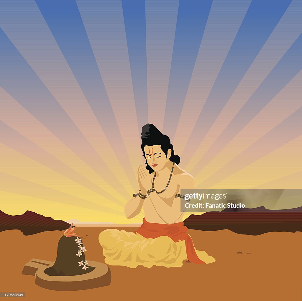 Sadhu praying in front of Shivling
