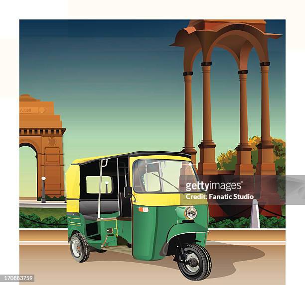 auto rickshaw near a war memorial, india gate, new delhi, india - new delhi stock-grafiken, -clipart, -cartoons und -symbole