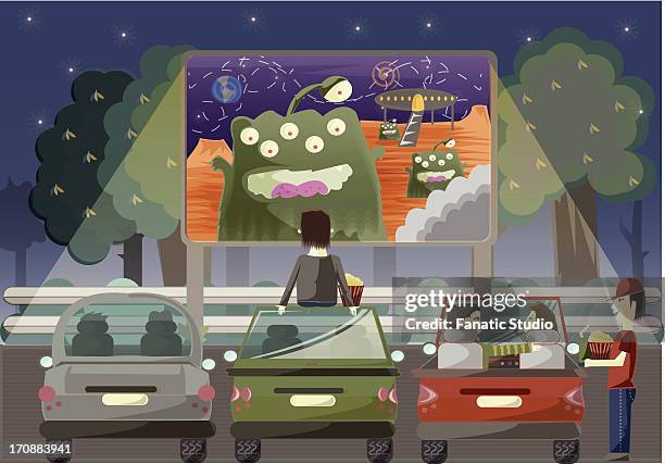 people watching movie in a park - drive in cinema stock illustrations