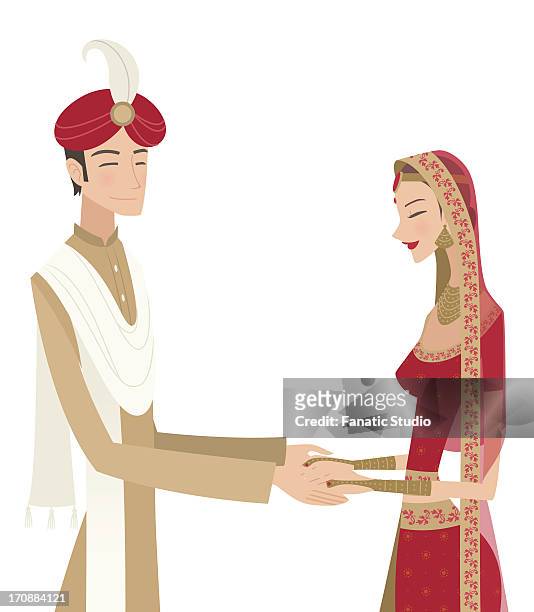 indian bride and groom in traditional dress at wedding ceremony - indian bride closeup stock-grafiken, -clipart, -cartoons und -symbole