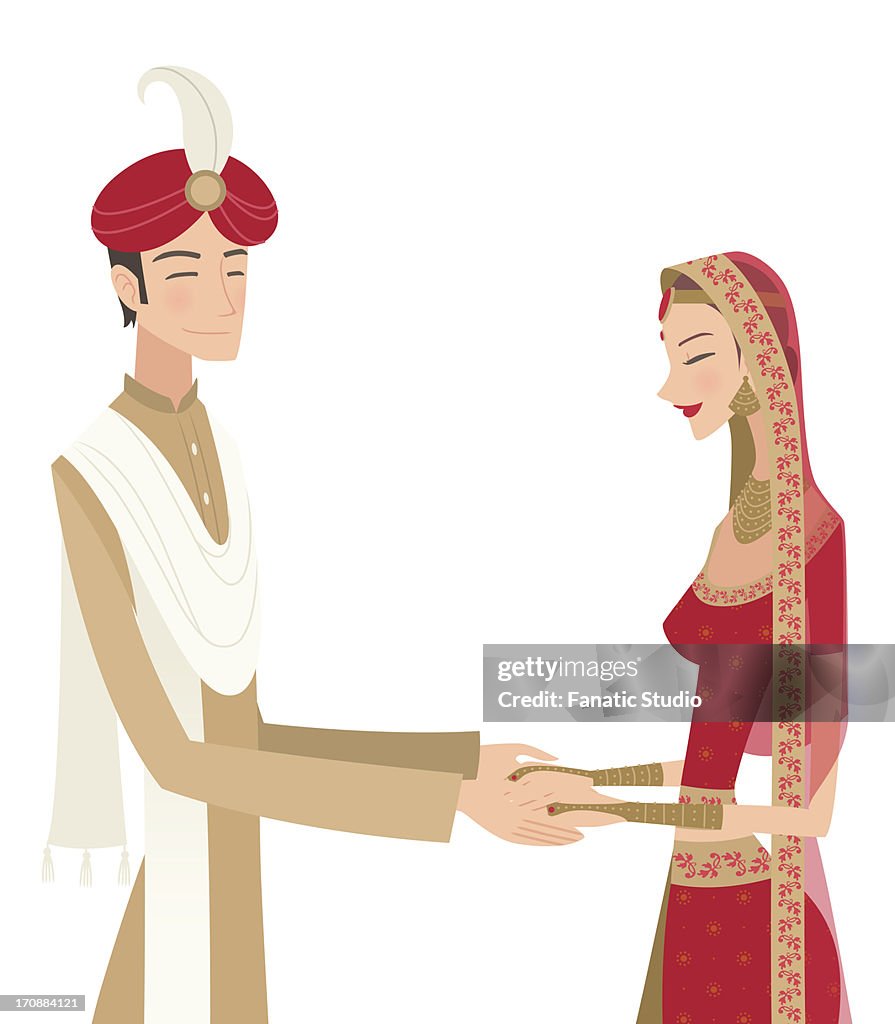 Indian Bride And Groom In Traditional Dress At Wedding Ceremony High-Res  Vector Graphic - Getty Images