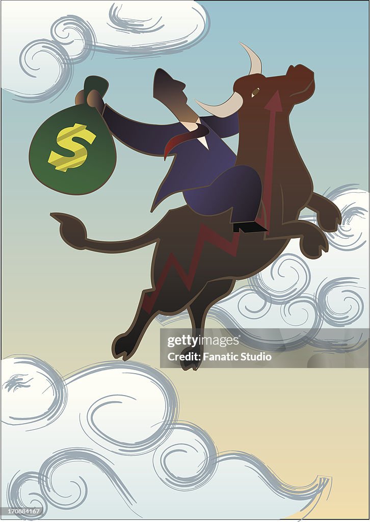 Businessman riding on a bull in the sky