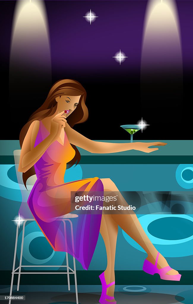 Woman sitting at a bar counter