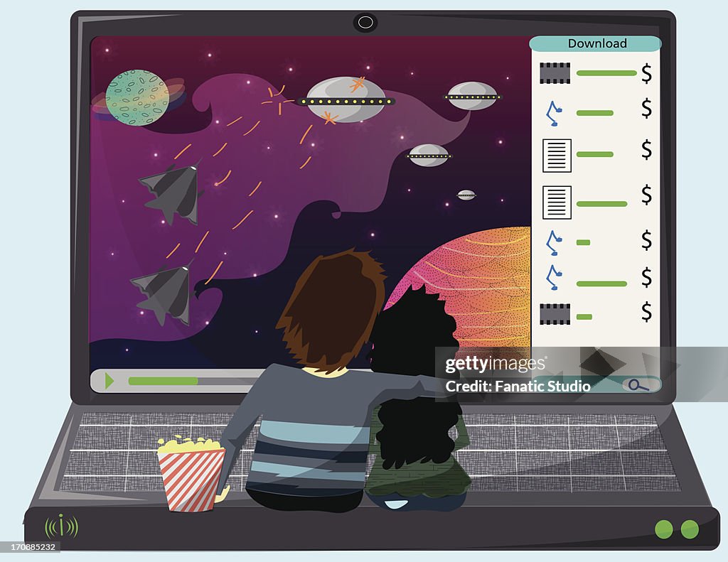 Couple watching online movie on a laptop