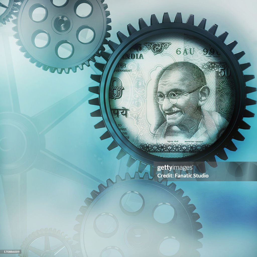 Indian currency on cog