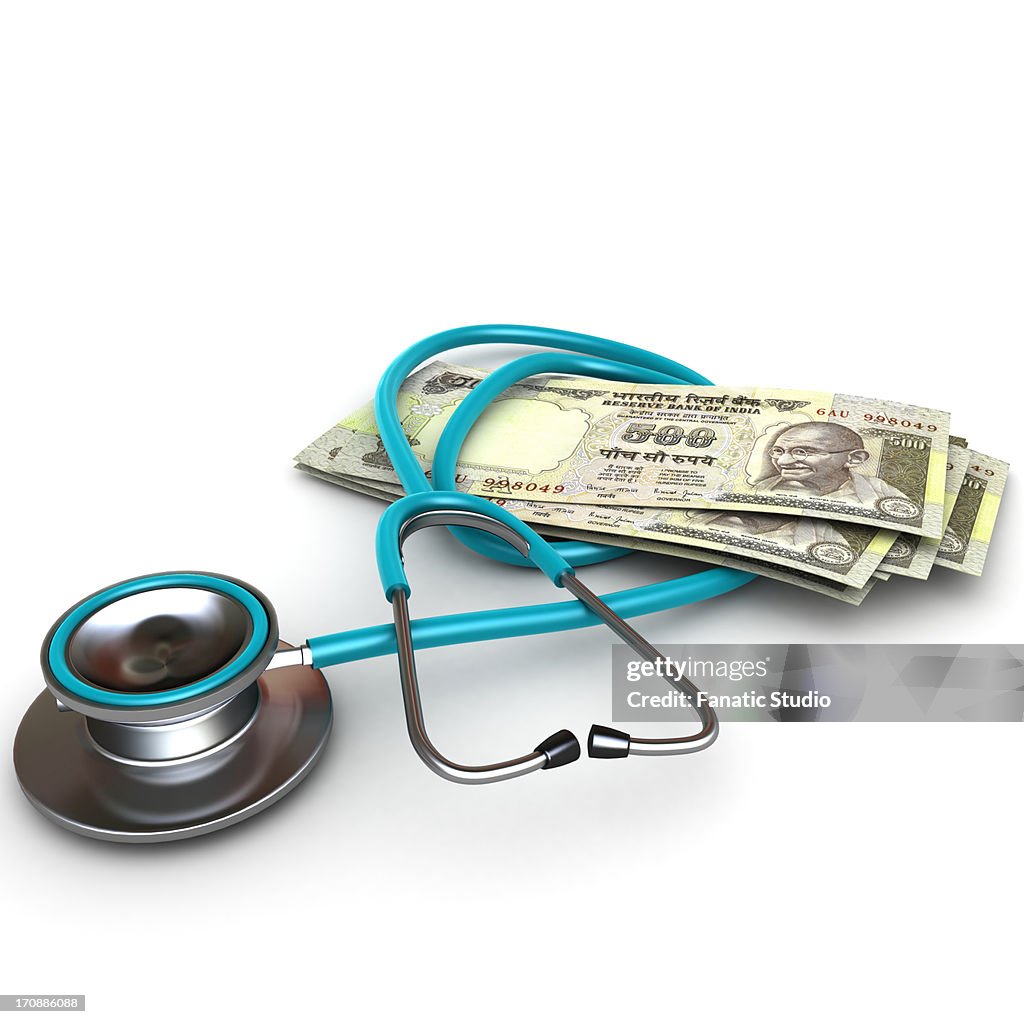 Image of stethoscope with Indian Rupee note