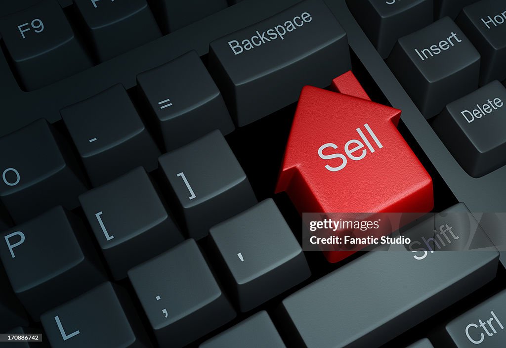 Illustrative image of keyboard with house button representing online property deal