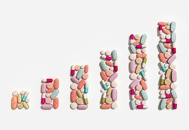 Illustration of rising cost of prescription drugs over white background