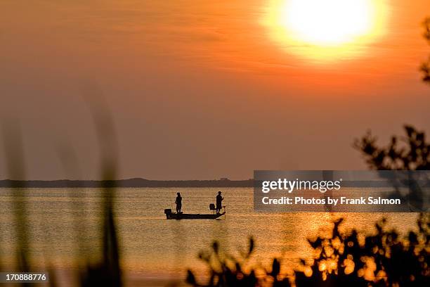 early fishing on the indian river lagoon - merritt island national wildlife refuge stockfoto's en -beelden