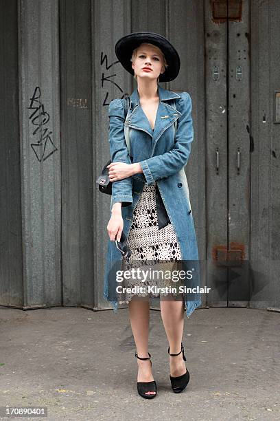 Model Chloe Jasmine wears a Mary Quant Hat, Karen Millen dress, See by Chloe Coat, Vintage Chanel bag, Zara shoes and Chloe sunglasses on day 2 of...