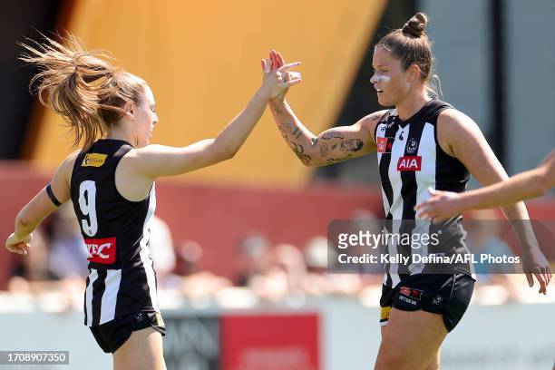 Alana Porter of the Magpies celebrates with Brianna Davey of the Magpies during the round five AFLW match between Collingwood Magpies and Essendon...