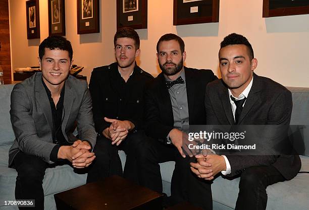 Jonathan Capeci, Drew Scheuer, Anthony Genca, and Joey Beretta of Dinner and a Suit pose during the MTV, VH1, CMT & LOGO 2013 O Music Awards at the...