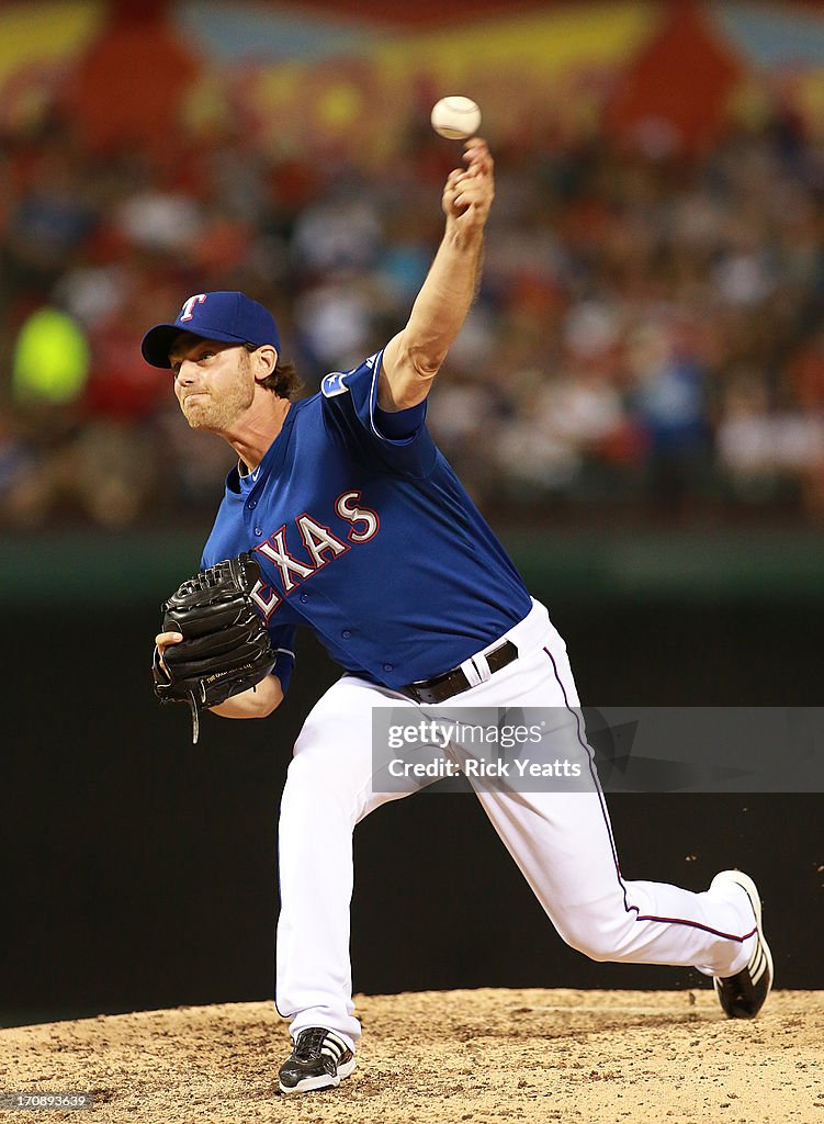 Cott Rangers Rockets Neal Cotts of the Texas Rangers pitches in the sixth inning against ...