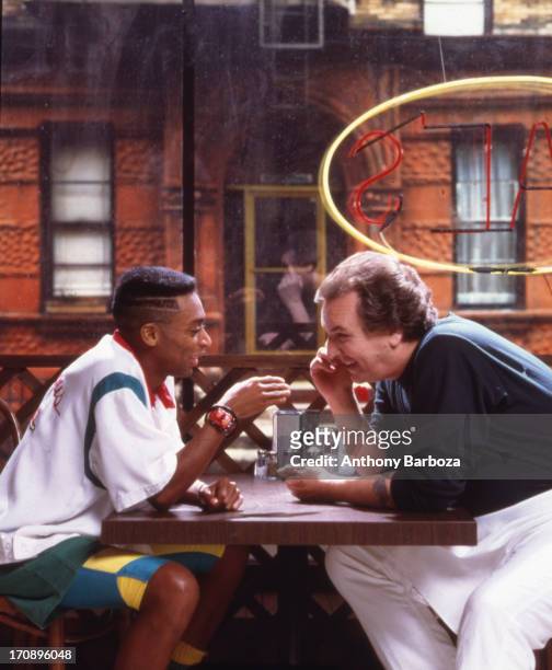 Portrait of American film director and actor Spike Lee and actor Danny Aiello on the set of their film 'Do the Right Thing' , New York, 1989.