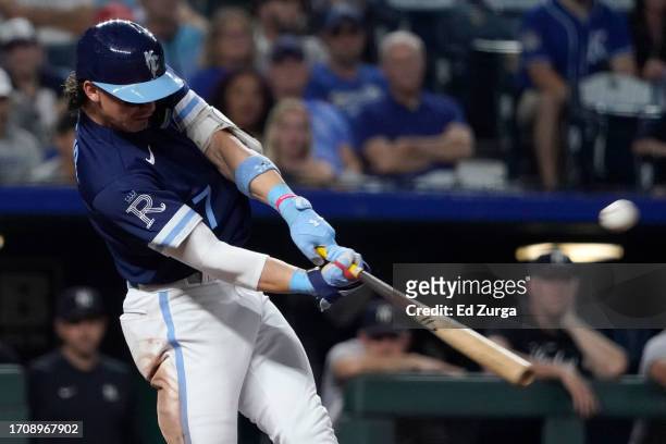 Bobby Witt Jr. #7 of the Kansas City Royals hits a two-run home run in the seventh inning against the New York Yankees at Kauffman Stadium on...