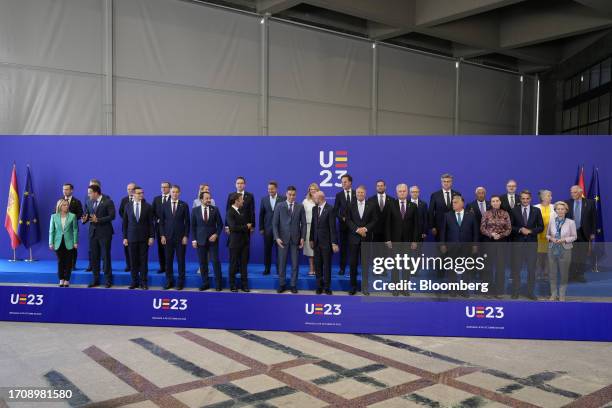 Pedro Sanchez, Spain's prime minister, center, and delegates during a family photo at an informal meeting of European Union leaders in Granada,...