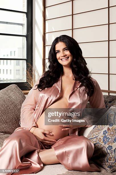 Pregnant model Shermine Shahrivar poses during a photo session on June 5, 2013 in Berlin, Germany.