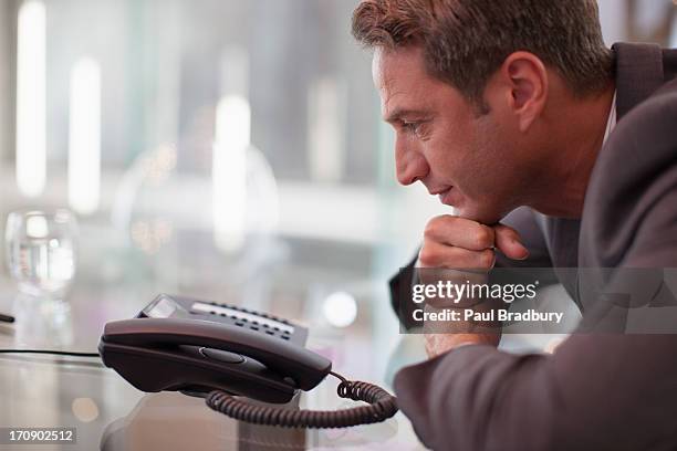 105 Waiting For The Phone To Ring Stock Photos, High-Res Pictures, and ...